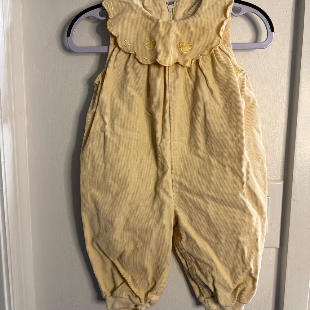 Yellow one piece for baby with collar and duck detail 9 months